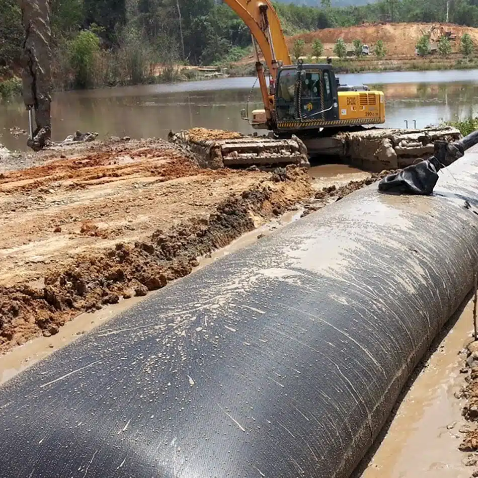 How do I install, fill, and stack geotubes?