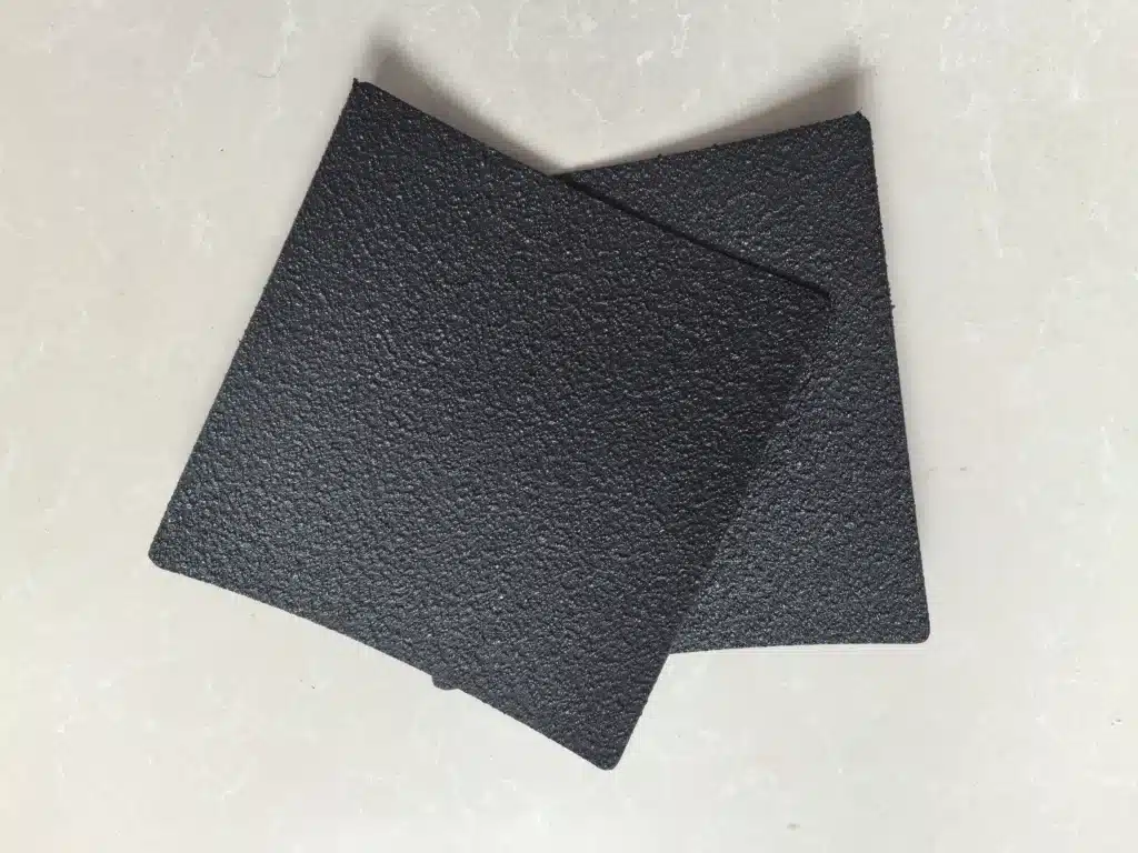 What is the difference between textured and smooth geomembrane?