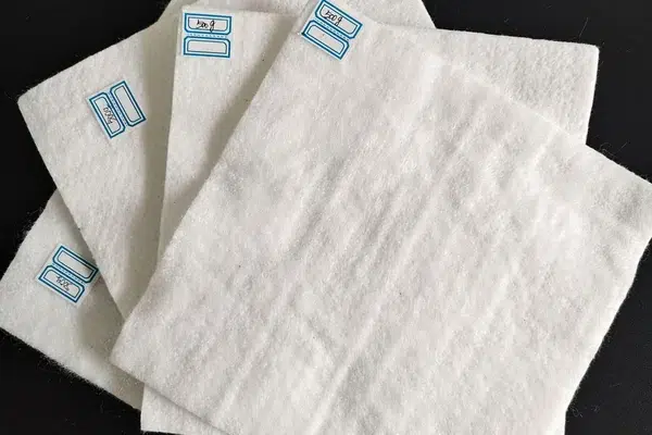 Nonwoven geotextile fabric for drainage and filtration selection