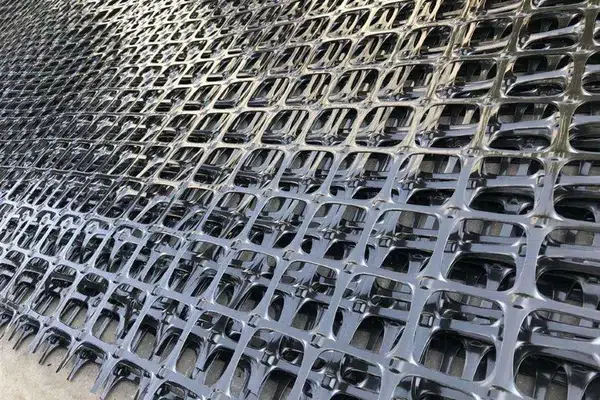 Geogrid aperture structure used to explain aggregate interlock and placement