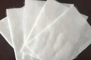 White nonwoven geotextile sheets used for drainage and filtration material selection