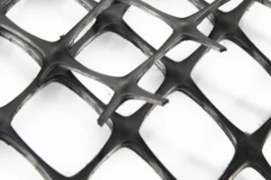 Open geogrid apertures used to review aggregate interlock and road-base stabilization